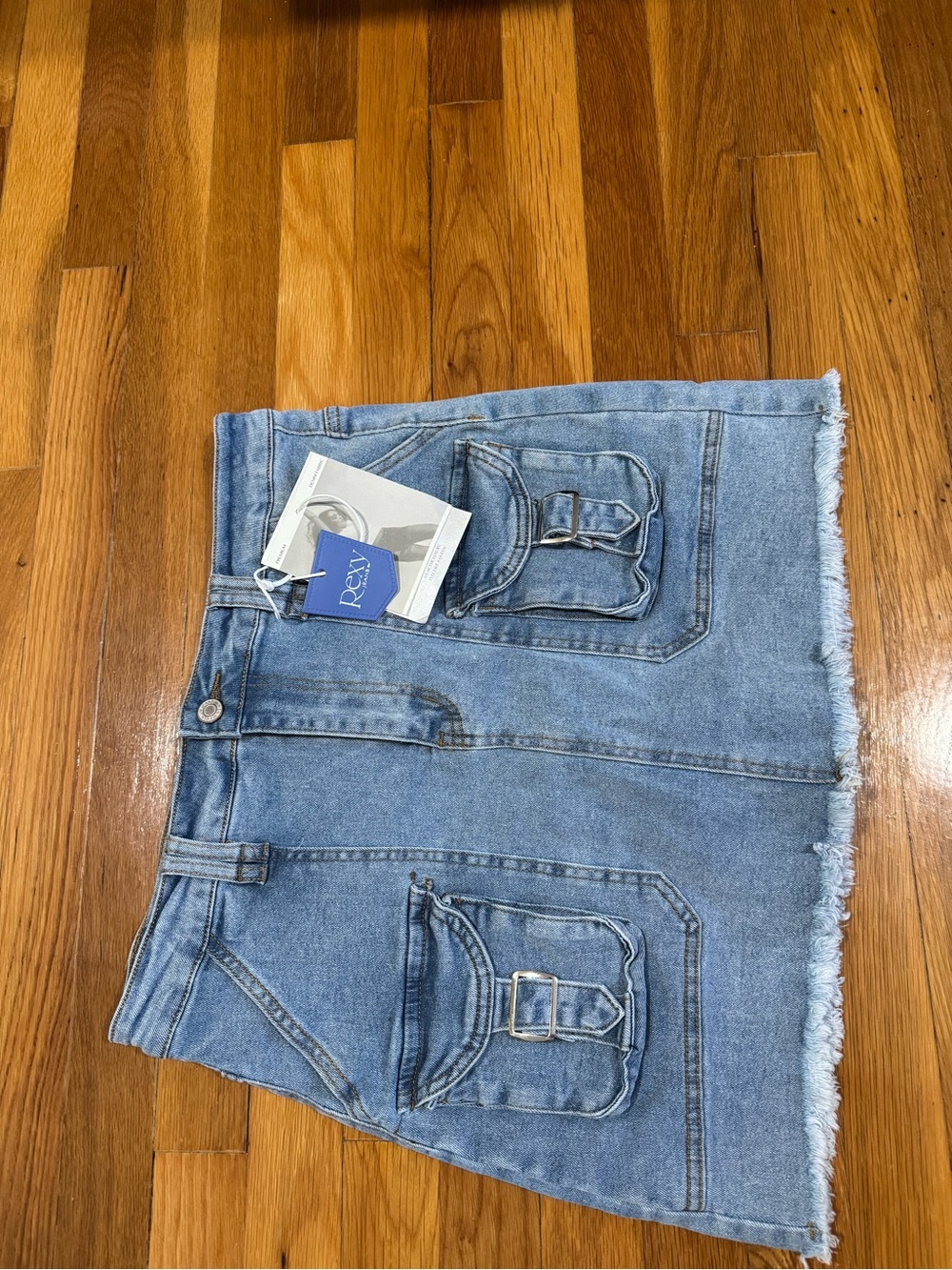 Women’s Light Blue Denim Jean Skort with Buckle Pocket Details